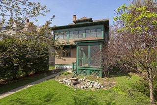 Another view of the CHARMING Back Yard with Screened-In Porch.
