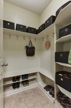Mud room ready to go with bench, cubbies, and hooks for everyone