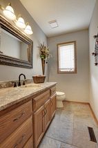 Main Level Powder Room with Granite Vanity!
