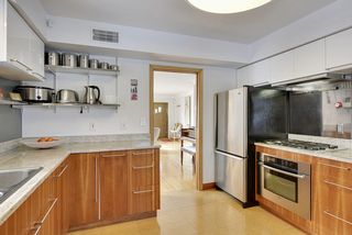The Kitchen is stunning! You will find Cork Floors, Stainless Steel Appliances & Granite Countertops! 
