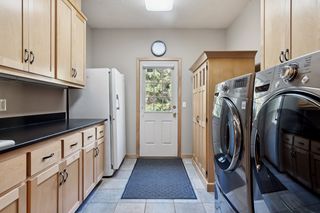 Now this is a laundry room!  Terrific storage.