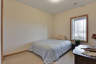 Lower level guest bedroom with views of golf course...