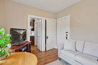 Another View of Living room in Apt #4.
Features all new vinyl thermal pane windows, Custom Stained Hardwood flooring & Ceiling fan/light.