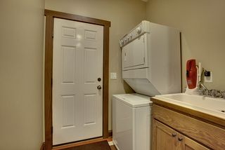 The laundry is located off the rear mudroom area.