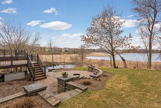 Wonderful space for entertaining with two tier maintenance free deck and fire pit, and peaceful views! 