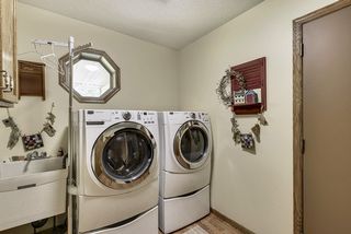 Mainfloor laundry off of the entry way and garage with laundry sink washer and dryer included!