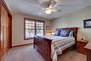 Guest bedroom, large bypass closet doors, excellent natural light.