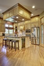 Beautiful custom cabinets with pull out shelves and walk in pantry