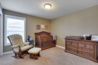 1 of 3 spacious junior bedrooms on second level. 