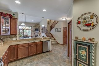 Open concept with kitchen views of informal dining and living areas. 