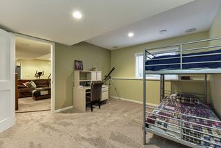 Common wall between the lower level living and bedroom #6 can easily be removed for a larger living space.