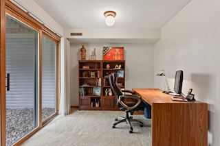 A wonderful office area or exercise area.  Complete with a walk-out to nature and Franlo park!