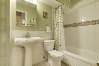 The Updated Bathroom features a Kohler Sink & Custom Tile...