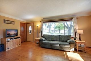 Gleaming hardwoods welcome you to this lovely home