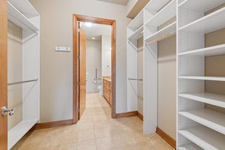 Walk-In Closet with adjustable custom organizers.