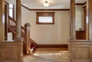 The Entry Foyer is loaded with Natural Woodwork! 