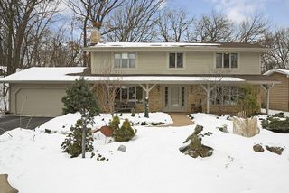Lush front and back yards complete with water features and professional landscaping 