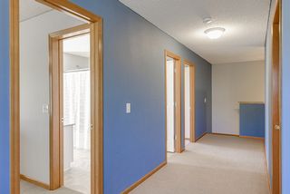 Spacious hallway on upper level wide enough for desks or shelving or...