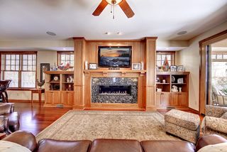 Bold craftsmen styling. Custom cherry mantel and granite fireplace surround complement a "perfect room". 