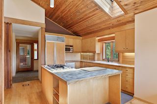 Spacious kitchen opens to dining & living room