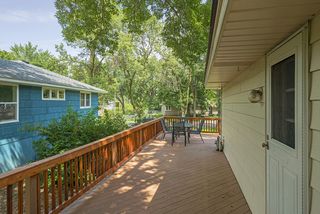 Enter the deck from the front of the house, back of the house or conveniently from the kitchen