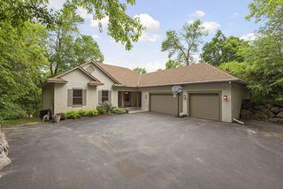 Welcome to privacy and serenity as you enter this beautiful walkout rambler 