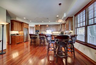 Beautiful Brazilian cherry floors combined with American Cherry cabinetry create a startling contrast.