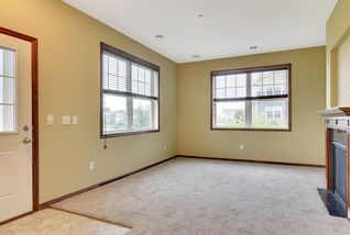 Expansive Living Room with cozy fireplace, new carpet and paint