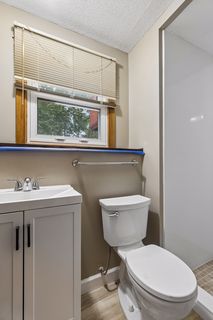 Convenient and refreshed lower-level 1/2 bath