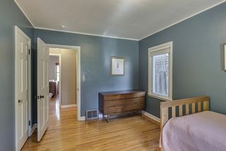 Six panel doors - white woodwork - gleaming hardwood floors...
