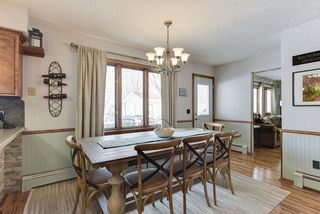 Large informal dining space between kitchen and living room