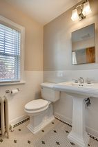 Newer lighting and faucets compliment the look!