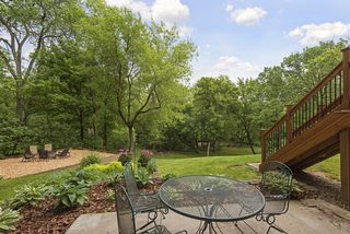Big mature trees surround this lovely property