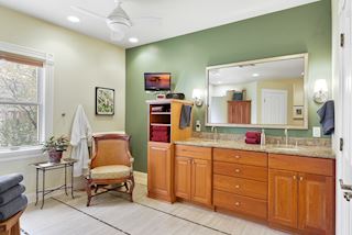 Master Bath is palatial with double sinks, separate shower, toilet and closet