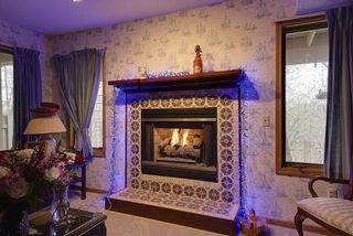 Lower level family room with cozy fireplace...