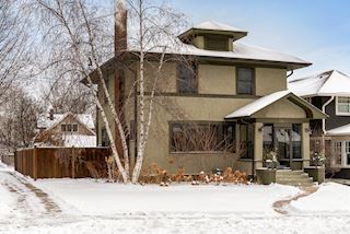 4601 Zenith Ave S in Linden Hills 3BR, 3BA with sunroom on a corner lot with fenced backyard and two car garage