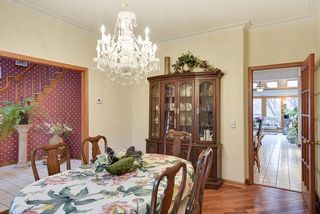 Formal dining room with gleaming hardwood floors...