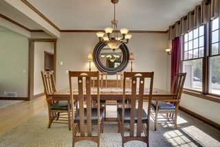 Spacious Dining Room - crown moldings border the ceiling - floor to ceiling columns frame the room from the Entry area.