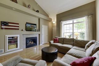 Vaulted ceiling, cozy fireplace and special lighting add charm to this lovely townhouse...