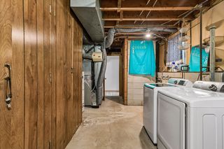 Lower-level laundry room with plenty of storage