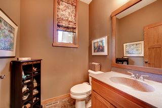 1/2 Bath off the Mudroom area and Garage.