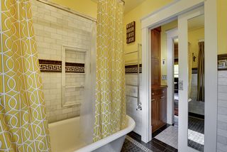 The 2nd Floor Bathroom features a restored Bathtub & Heated Towel Bar! 