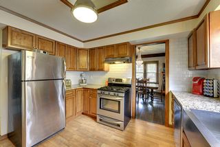 The Kitchen features Granite Countertops & Gas Range! 
