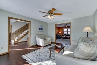 Living room with views of entry or family room 