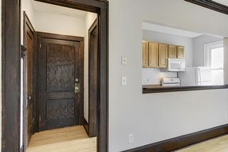 Entryway/foyer with a coat closet.