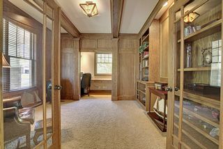 Den/Study has a private office area - similar to a pocket office. Loaded with special millwork details and panels.