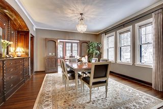 The gracious Formal Dining Room features Hardwood Floors, Crystal Chandelier and beautiful Built-In Buffet...