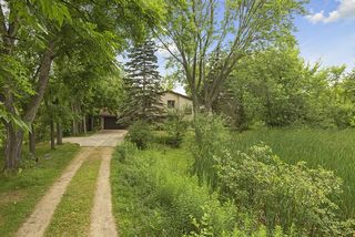 A beautiful one-owner home on a private 0.86 acre lot