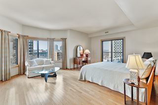 Master Bedroom Suite large enough for king sized bed, seating and walk in closet, vanity and private shower and WC.