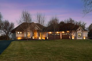 Stucco Front, Gable Roof, Oversized 4 Car Garage